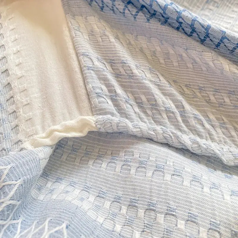Blue and white striped cotton jacquard fitted sheet set with textured basketweave pattern for bedroom use