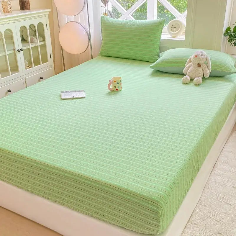 Light green striped fitted sheet with subtle ribbed texture in cotton jacquard sheet set for bedrooms