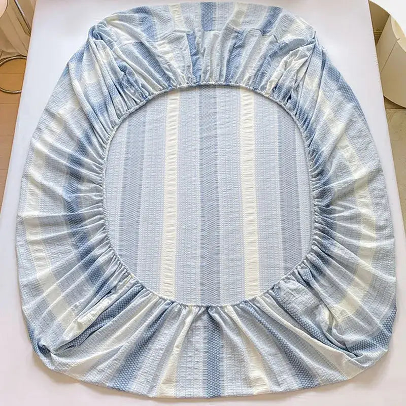 Blue and white striped cotton jacquard fitted sheet set with soft stretchy fabric perfect for bedroom use