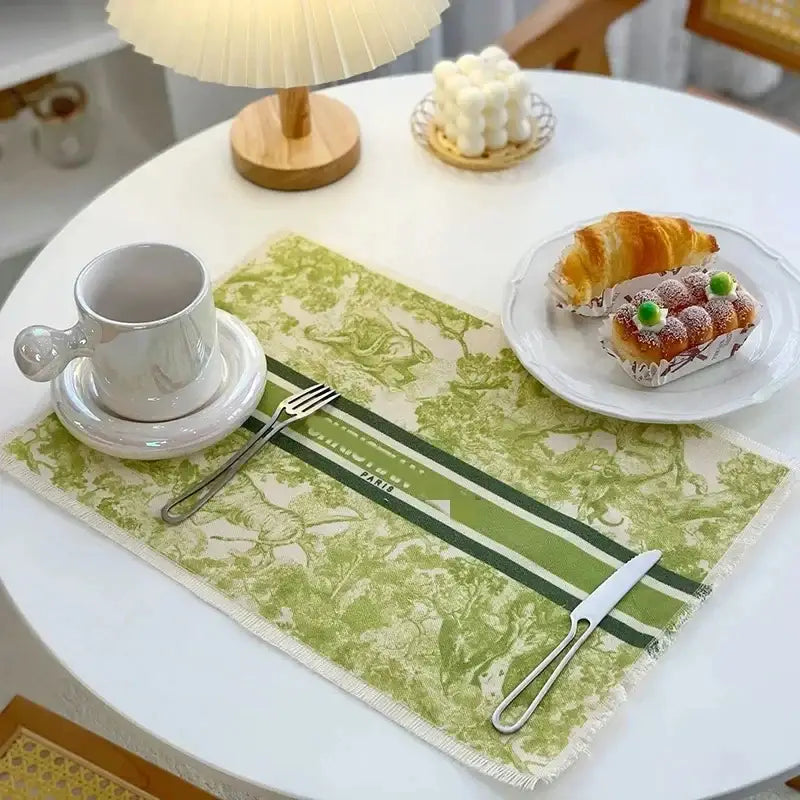 Green and white toile-patterned linen place mat with frayed edges decorbites cotton linen kitchen dining decor