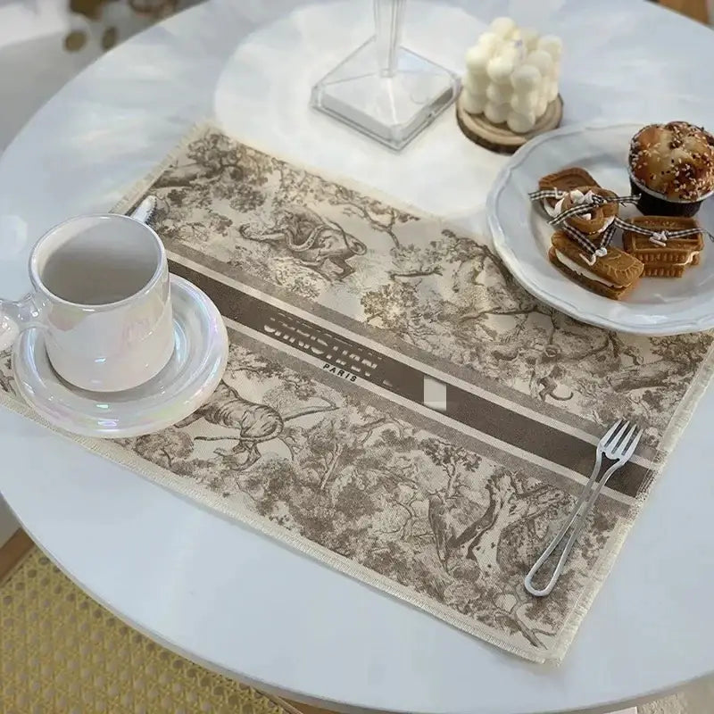 Beige and brown printed linen place mat with vintage elephant motif and paris text in decorbites cotton linen set