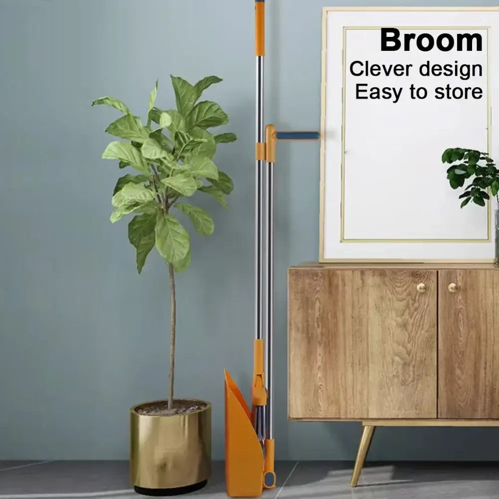 Orange and silver telescopic broom with matching dustpan broom scoop set designed for easy storage and kitchen cleaning