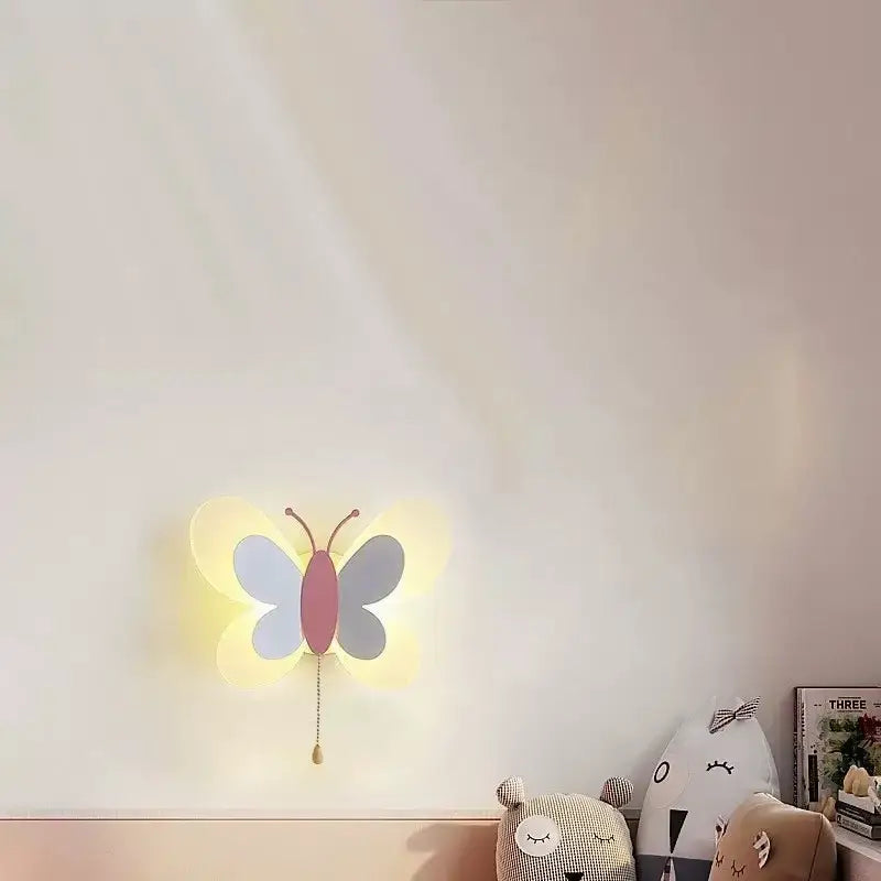 Pastel blue butterfly girl cartoon wall sconce with soft glowing light and dangling pull chain for children room