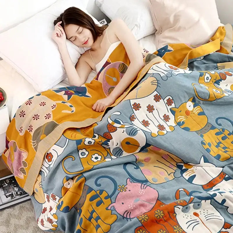 Cozy blue cartoon cat summer quilt made of cotton featuring colorful playful decorbites cartoon cat patterns and floral accents