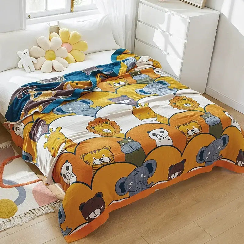 A cozy cotton cartoon cat summer quilt blanket with playful lions elephants and pandas in blue yellow orange and gray