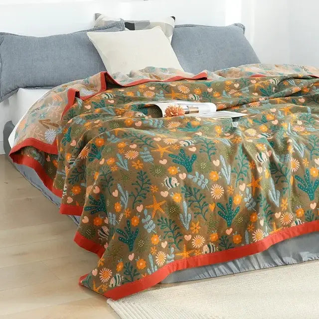 Olive green plush cotton throw blanket with vibrant floral sea-themed pattern and bold red trim for cartoon cat summer decorbites cartoon cat