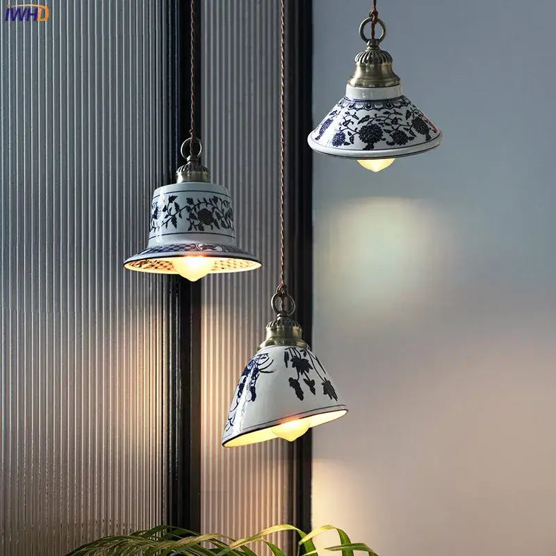 Three white ceramic led pendant lamps with blue floral patterns and brass fixtures for dining room lighting decorbites ceramic led