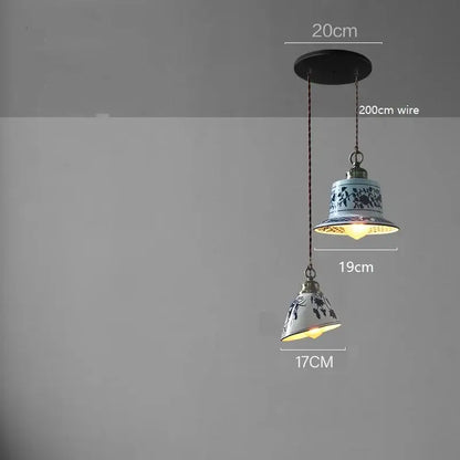 Blue floral ceramic led pendant lamp with ornate metal fixture hanging from 200cm wire for dining room decorbites ceramic led