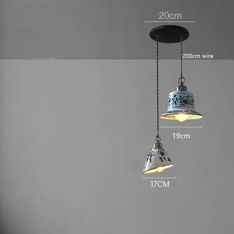 Blue floral ceramic led pendant lamp with ornate metal fixture hanging from 200cm wire for dining room decorbites ceramic led