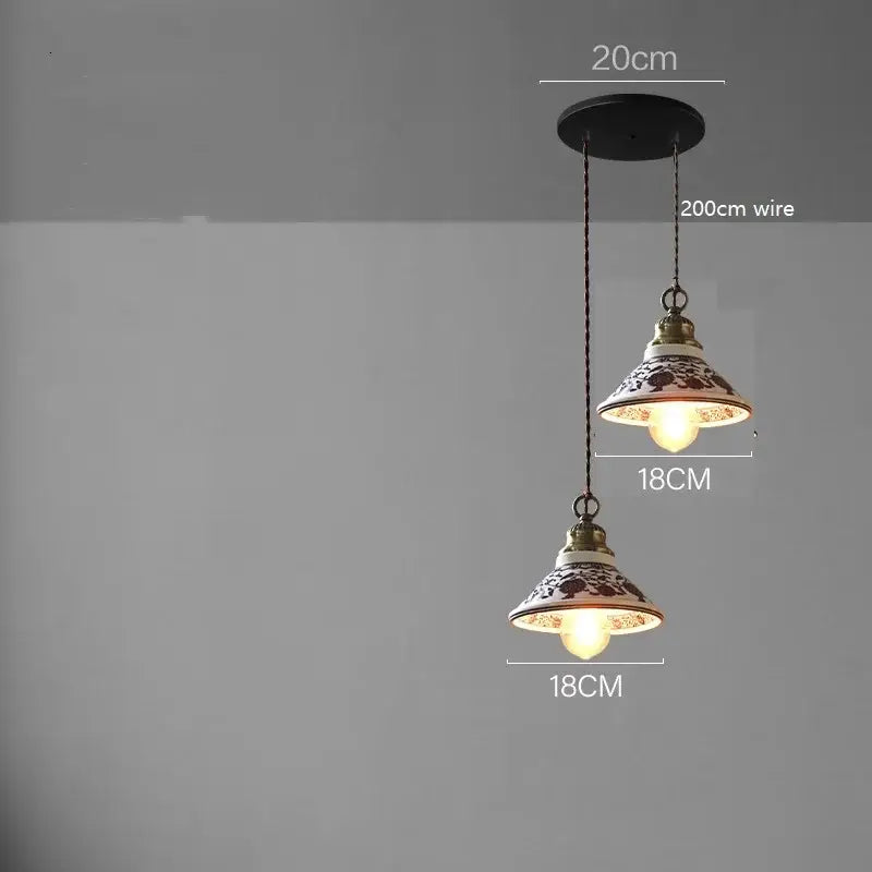 Vintage-style blue floral ceramic led pendant lamp with intricate white and dark brown patterns by decorbites for dining room lighting