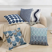 Set of five decorbites blue floral cushion covers with blue floral geometric wave and geometric patterns on textured fabric