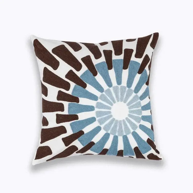 Blue floral mandala cotton pillow cover featuring a radial embroidered pattern in blue and brown for living room decor
