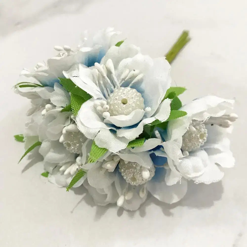 A delicate decorbites blue flower cherry stamen fabric bouquet with pearl embellishments and green satin leaves for decor