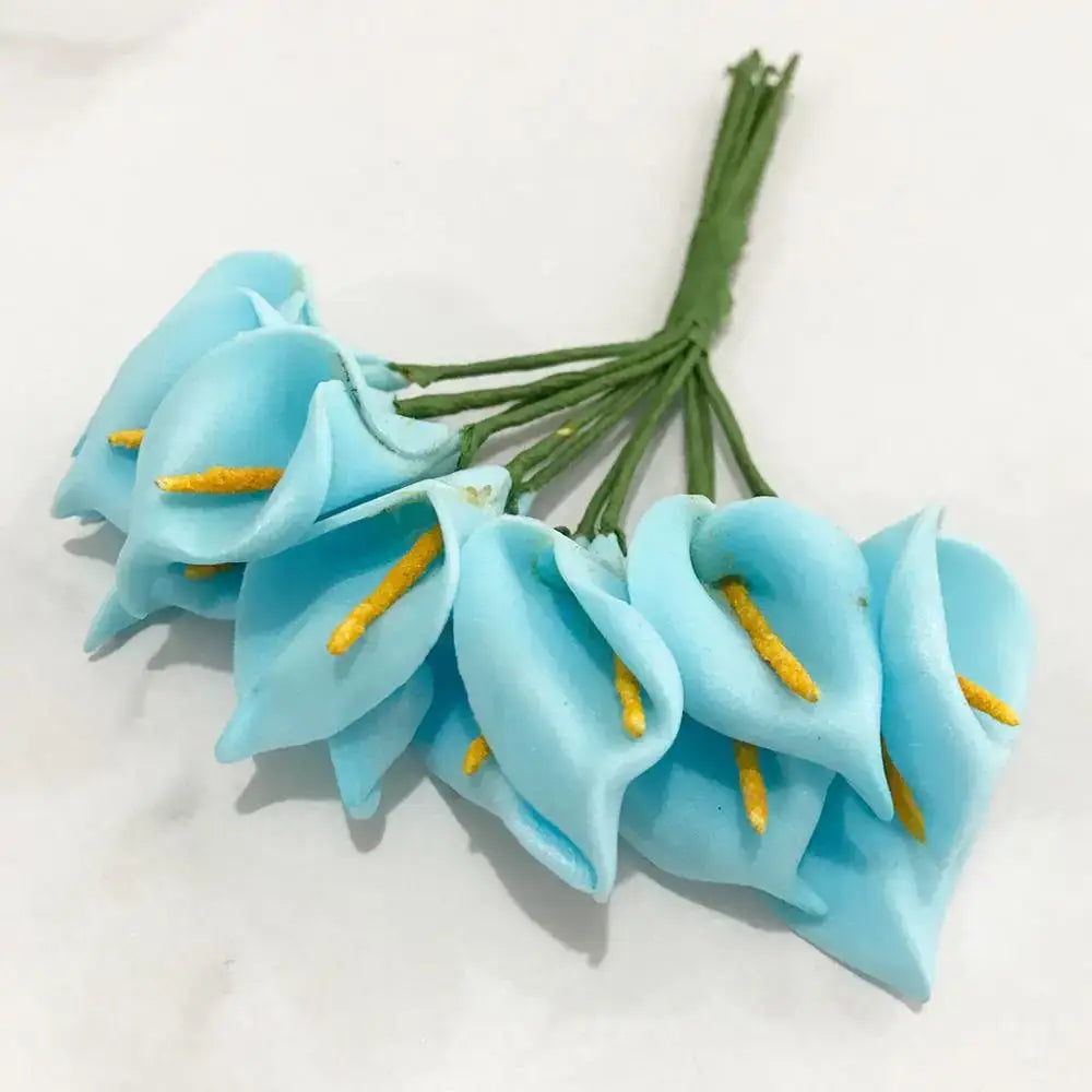 A delicate decorbites blue flower cherry bundle with light blue calla lilies and yellow stamen for living room decor