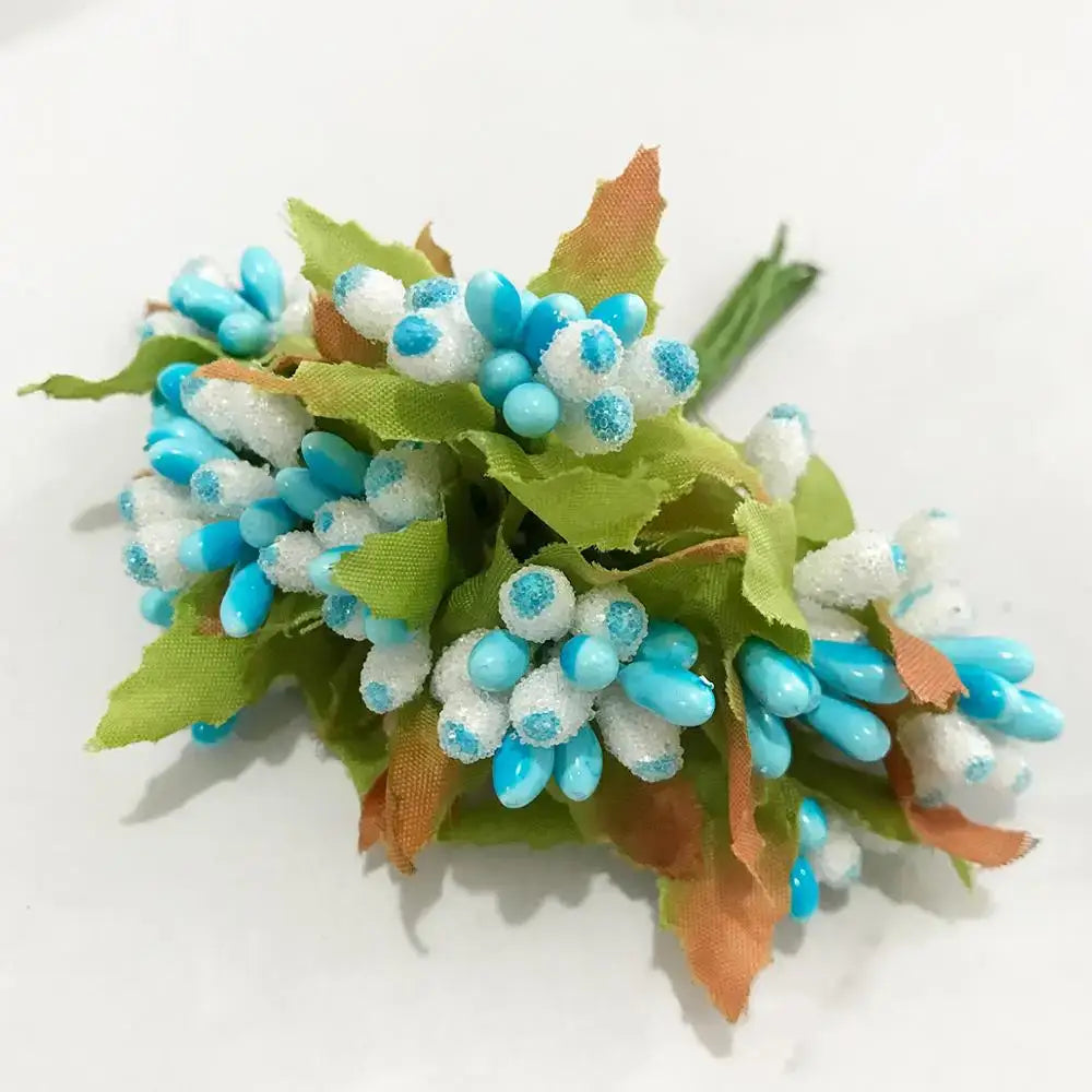 A blue flower cherry stamen berries bundle with vibrant turquoise artificial berries and white sugar-coated accents for decorbites blue flower living room decor
