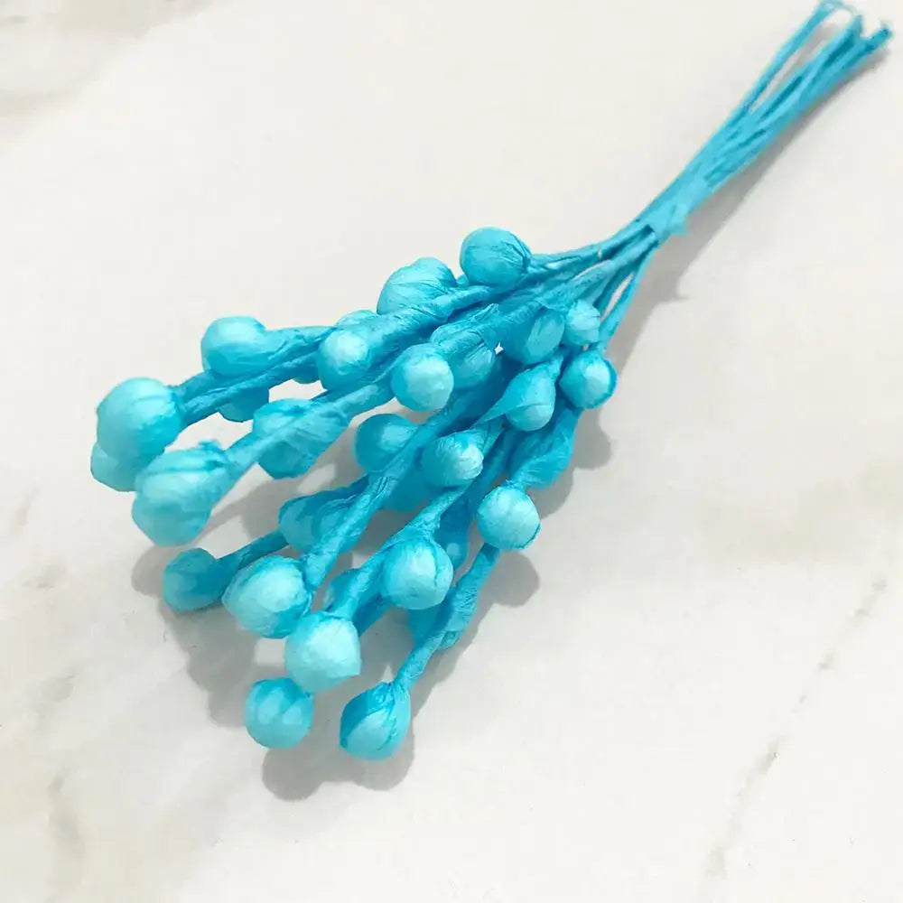 A bundle of turquoise paper-papery blue flower cherry stamen berries with textured blooms for living room decorbites decor