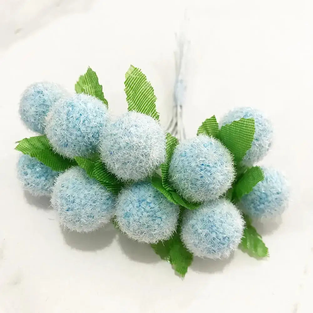 A cluster of light blue fuzzy fabric blue flower cherry stamen berries with green ribbon leaves for living room decorbites decor