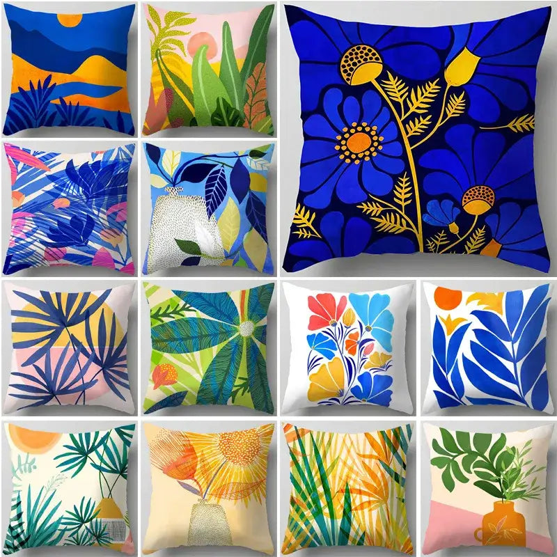 Blue flower leaves pattern living room throw pillow with vibrant blue and golden-yellow floral decorbites design