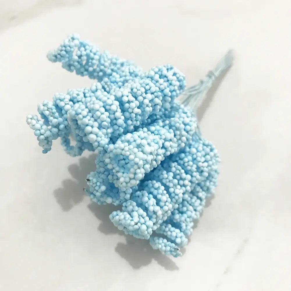 A delicate stamen berries bundle of light blue flower stamen made of bead-covered dried flowers for kitchen cake decor