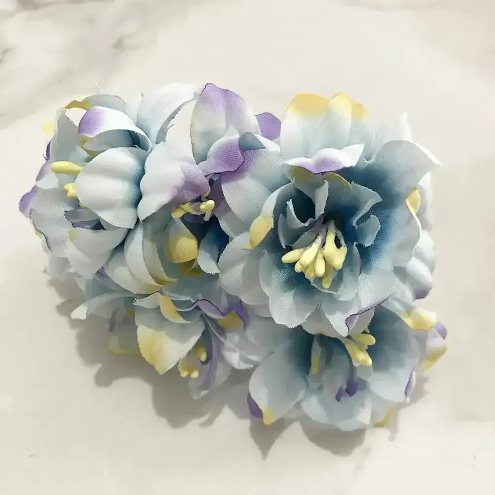 Delicate pastel blue flower stamen berries bundle with lavender fabric flowers and yellow centers for kitchen cake decor