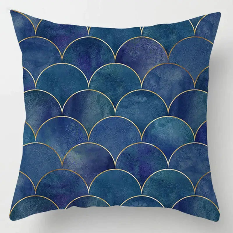 Blue geometric marble throw pillow with blue and purple scalloped pattern and gold outlines for living room decor
