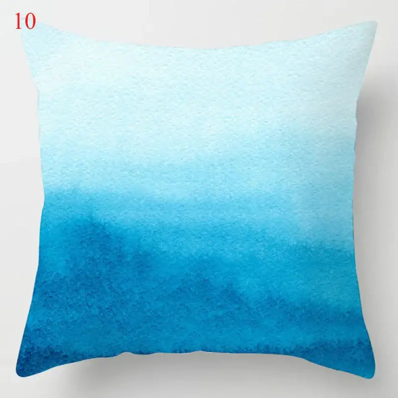Blue geometric marble square cushion with soft watercolor gradient from pale sky blue to deep ocean blue for decorbites living room decor