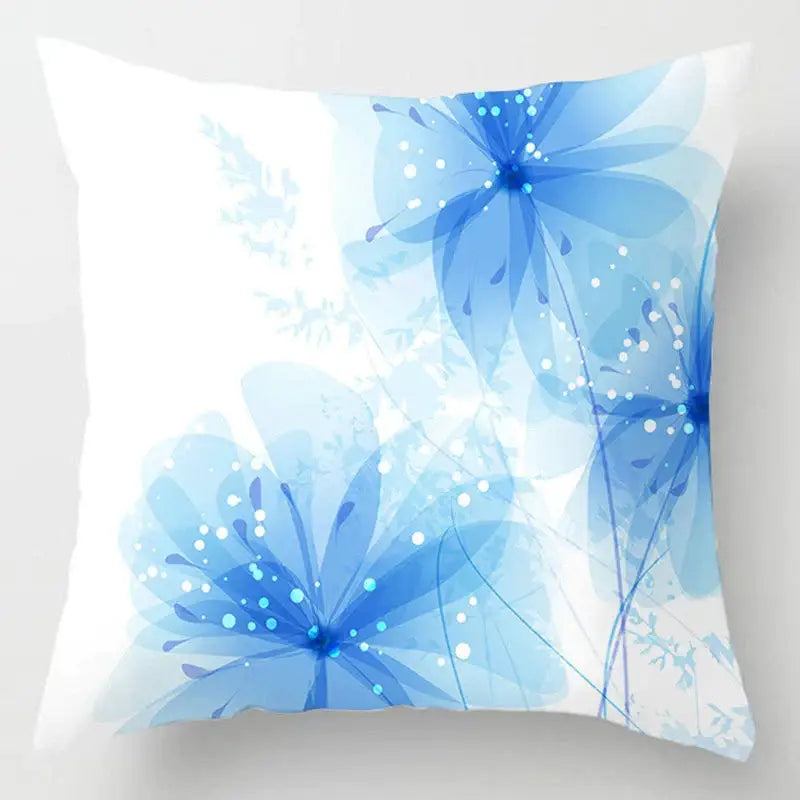 A square throw pillow with a delicate blue geometric marble floral design and glowing white dots for living room decorbites decor