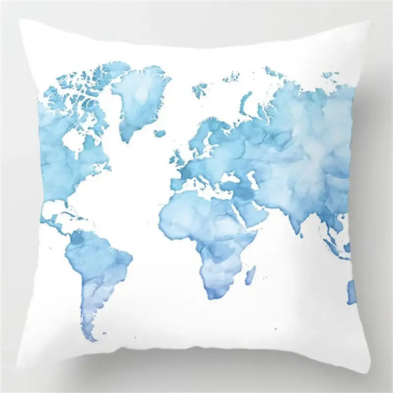 White throw pillow with a blue watercolor world map design for decorbites blue geometric marble living room decor