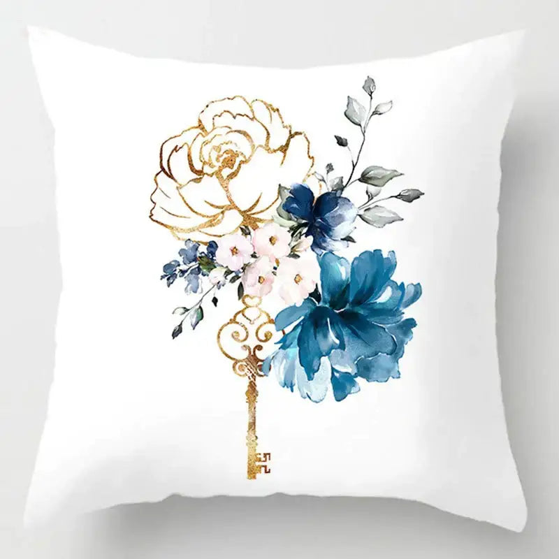 White throw pillow with watercolor floral and gold-leaf key design for decorbites blue geometric marble stripe decor