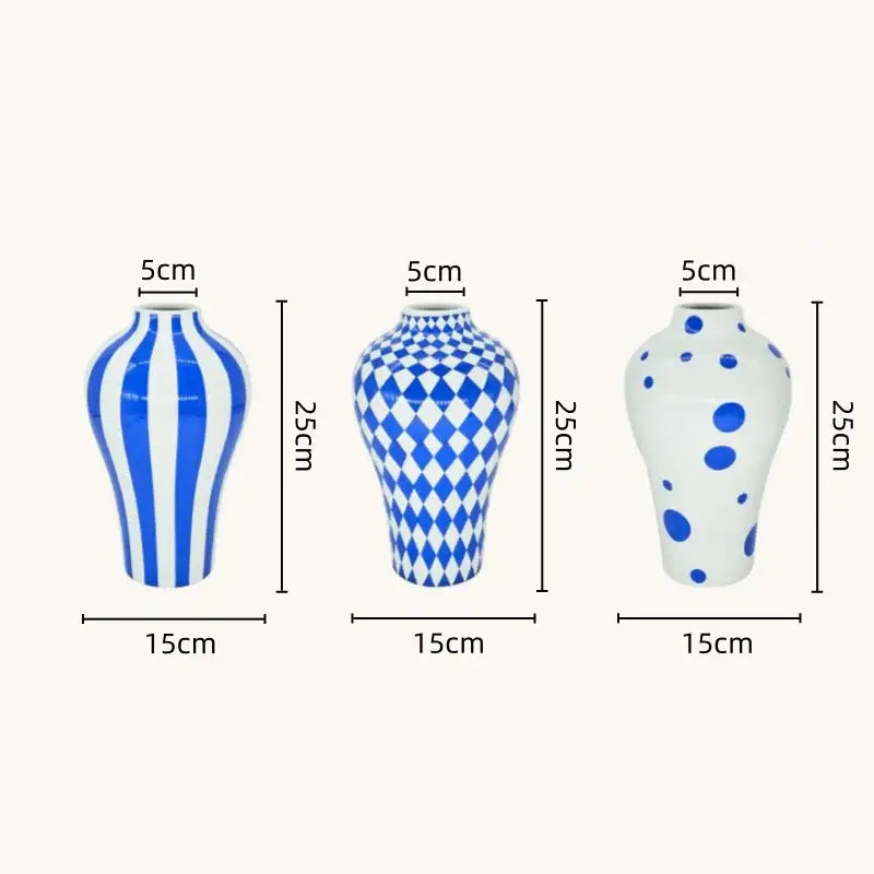 Three blue geometric quilted ceramic vases with vertical stripes diamond lattice and polka dots for living room decor