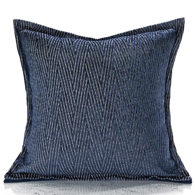 Deep blue decorbites blue geometry jacquard pillow cover with textured herringbone weave and navy piping edges