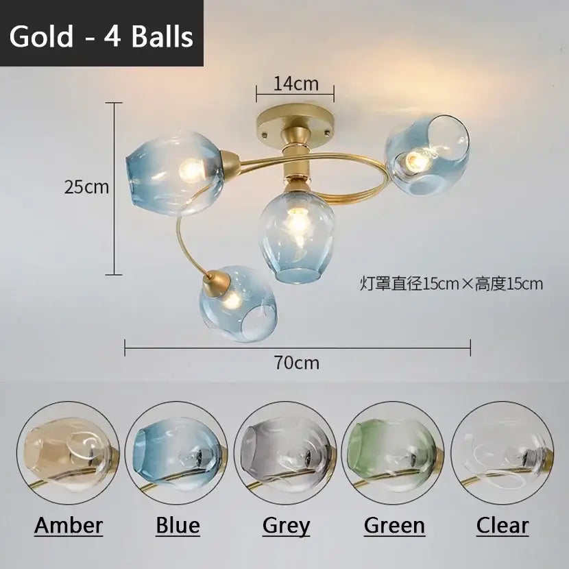 Blue glass ball led chandelier with brass finish featuring four translucent blue glass ball shades for dining room decorbites glass ball
