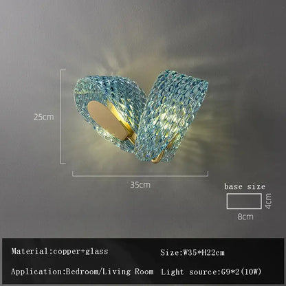 Blue textured glass wall sconce with copper accents complementing decorbites blue glass flower ceiling chandelier for dining room