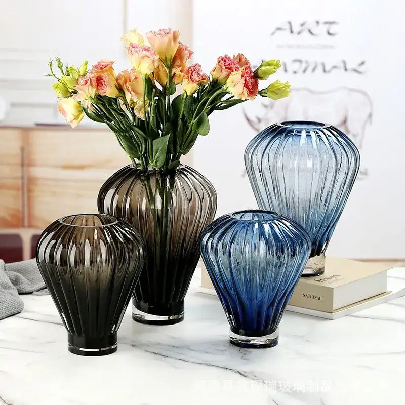 Set of four modern glass hot air balloon vases in gradient black dark gray and blue with ribbed texture and clear bases