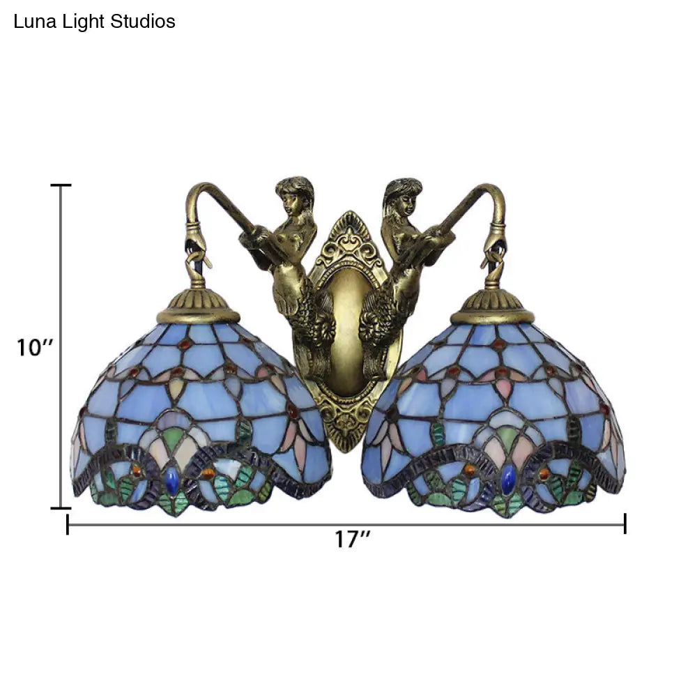 Aplique de pared mediterráneo de cristal azul con forma de cúpula y dos luces: perfecto para la iluminación del salón.