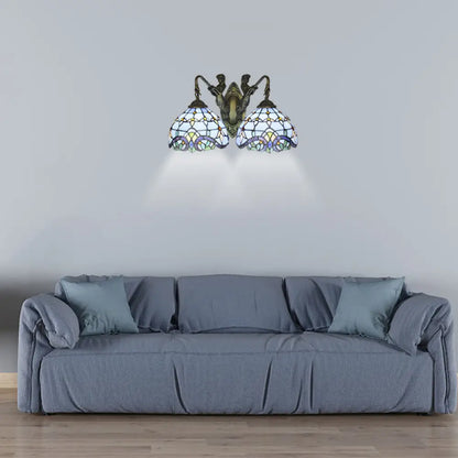 Aplique de pared mediterráneo de cristal azul con forma de cúpula y dos luces: perfecto para la iluminación del salón.