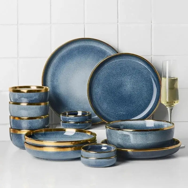 Blue gradient ceramic plate set with gold rims made of ceramic for elegant dining room use