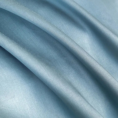 Light blue satin fabric with smooth glossy finish in decorbites cotton solid color bedding set for bedroom embroidery