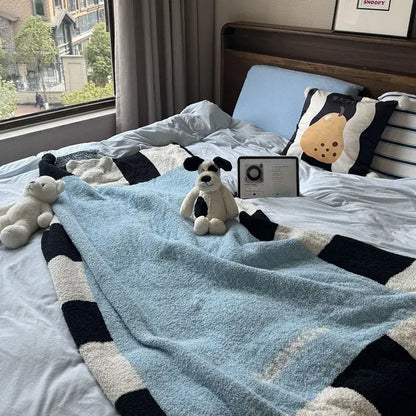 Blue green and black momochi flannel sofa blanket with blue and black stripes and a fluffy texture for decorbites cozy decor