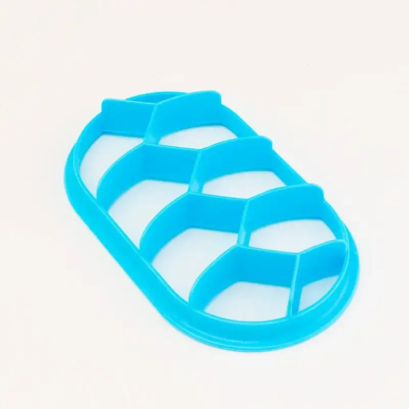 Bright blue plastic baking tool shaped like a turtle shell with hexagonal cutouts for oval bread molds