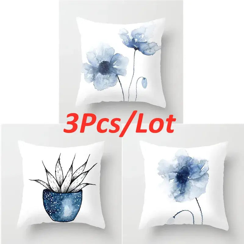 White throw pillows with watercolor blue ink flower and succulent design for decorbites blue ink home decor