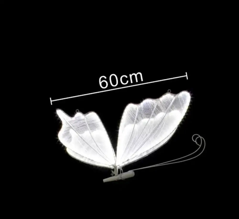 A glowing white butterfly-shaped blue lace led decorative light fixture 60cm wide for wedding or bedroom decorbites blue lace