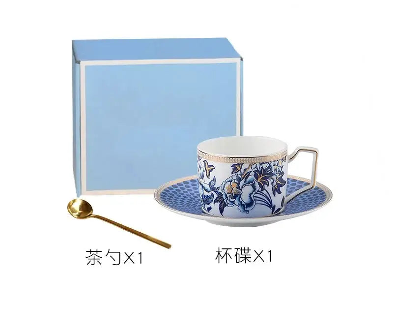 Blue and white porcelain teacup with gold trim and floral design from decorbites blue lotus dinnerware set