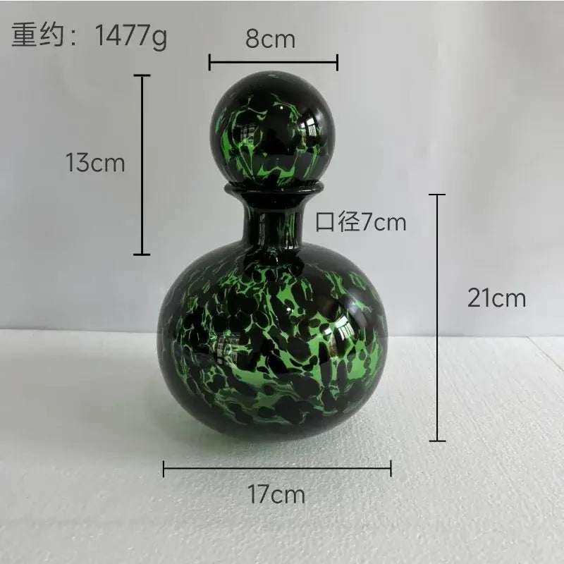 Glossy green and black marbled glass perfume bottle with spherical stopper for decorbites leopard print glass vase decor