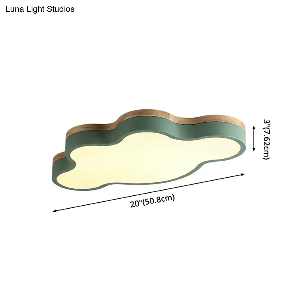 Blue and natural wood cloud flush mount ceiling lamp with matte sage green body and warm light for kids bedroom