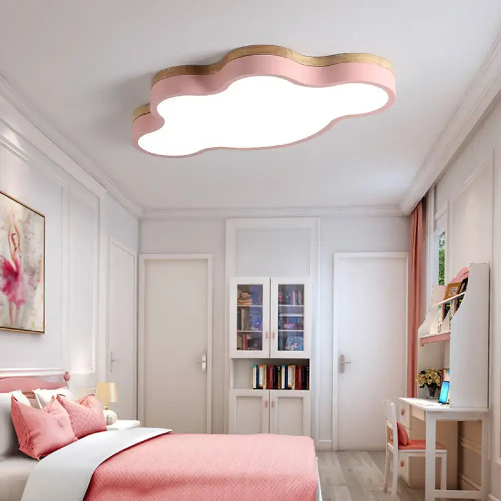 Pink cloud-shaped flush mount ceiling lamp with wooden trim designed for kids bedroom lighting