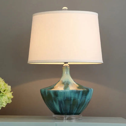 Lámpara de noche nórdica azul con forma de tambor, fabricada en tela y con base de cerámica - 1 luz