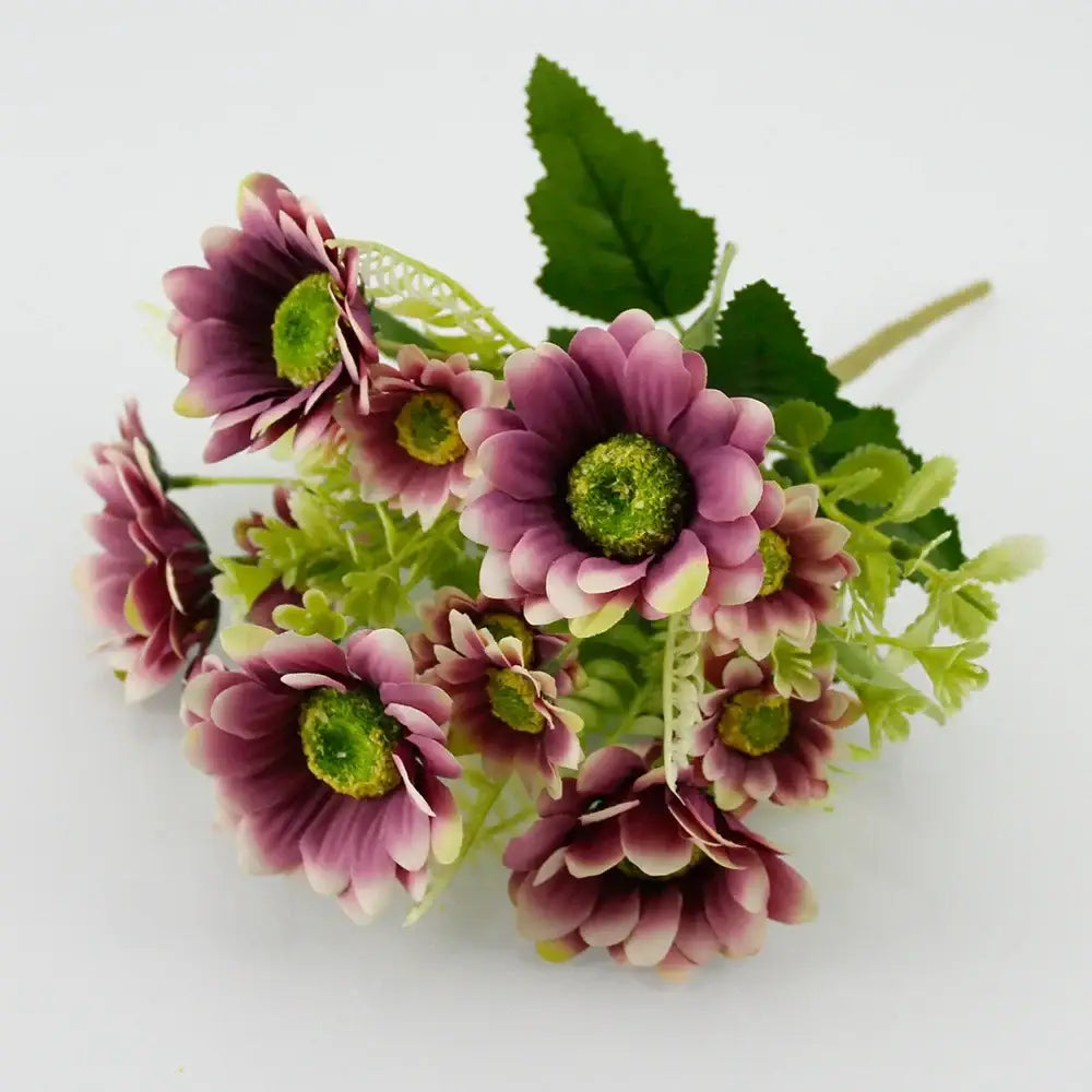 A cluster of purple and green silk fake flowers with detailed petals for blue peony and tea rose home decor
