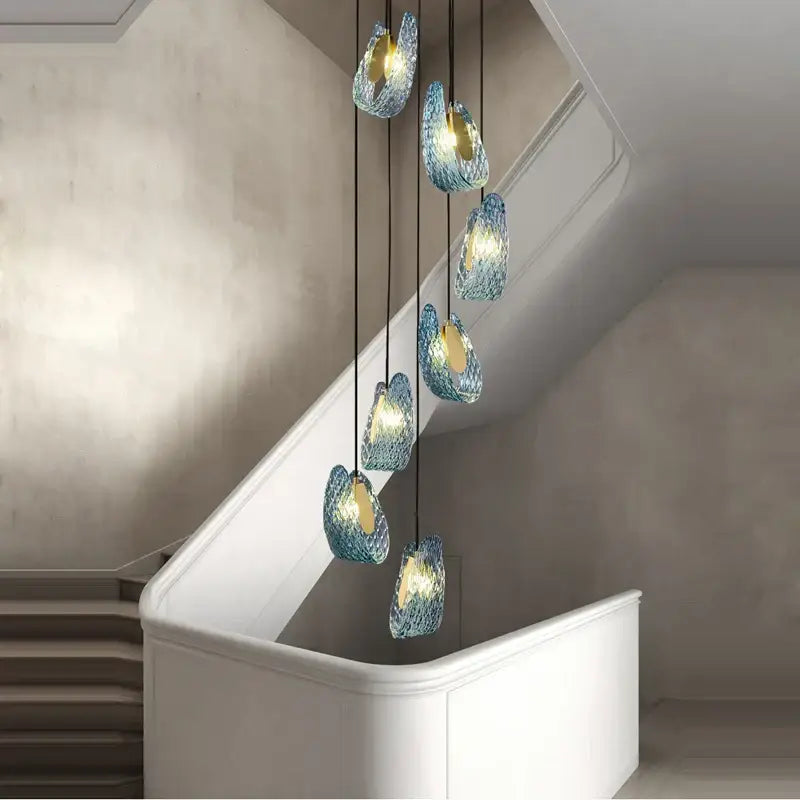 Blue queen crystal glass cascading chandelier with blue textured shell-like pendant lights for elegant staircase decorbites blue queen