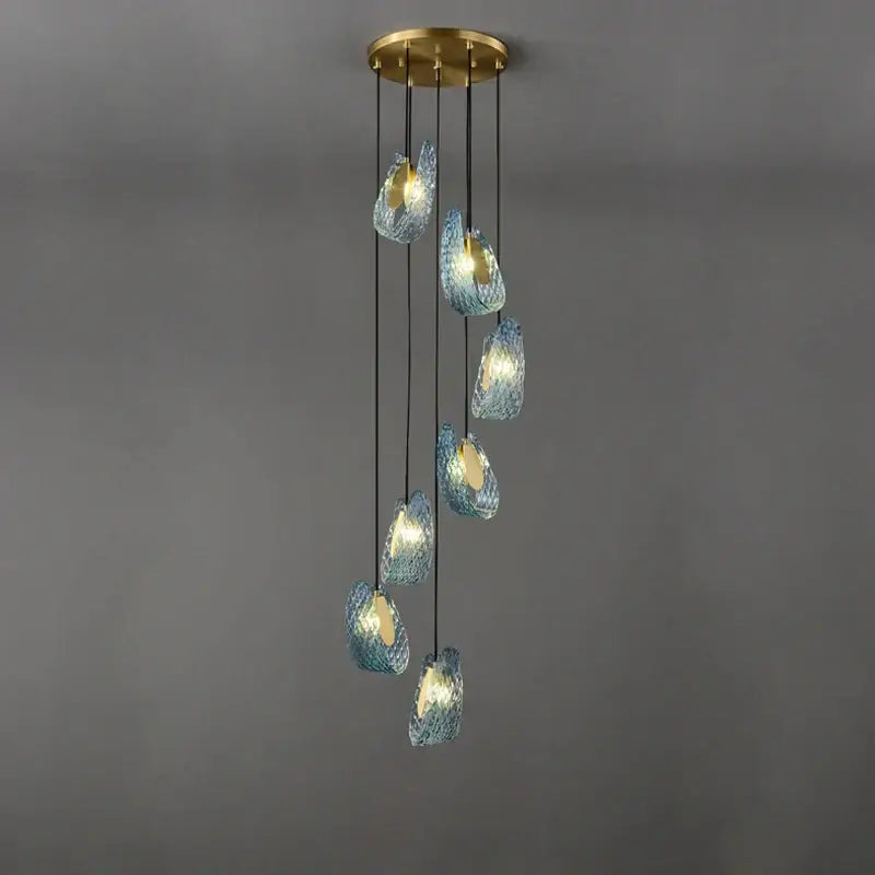 Blue queen crystal glass cascading chandelier in blue with brass ceiling mount for staircase lighting by decorbites blue queen